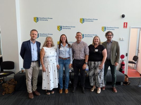 6 people in a workshop